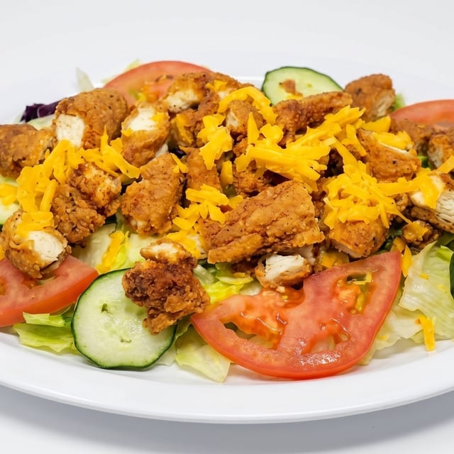 Chicken Strip Salad with Fries.